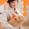 thumbnail image 4 of Juguete de Peluche Kabibala con Tocado Naranja. Suave Almohada de Muñeco de Peluche Kabibala. Es de Abrazo ., 4 of 5