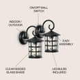 thumbnail image 4 of JONATHAN Y Cadiz 6" 1-Light Iron/Seeded Glass Cottage Rustic Scrolled Lantern LED Outdoor Sconce, Black (Set of 2), 4 of 9