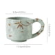 thumbnail image 5 of Taza de café de cerámica hecha a mano con estampado de hojas de bambú en relieve, 290 ml, textura rústica, apta para microondas, apilable, regalo para amantes del café., 5 of 7