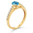 thumbnail image 3 of Gem Stone King 10K Yellow Gold Swiss Blue Topaz and White Lab Grown Diamond Engagement Ring for Women (0.73 Cttw, Oval 6X4MM, Gemstone November Birthstone, Size 8), 3 of 4