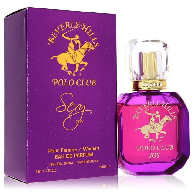 beverly hills polo club sexy joy eau de parfum spray by beverly fragrances — frasco facetado de vidrio fucsia junto a caja morada con logo dorado; tapón transparente, atomizador dorado y texto "POLO CLUB JOY" visible; contenido 50 ml.