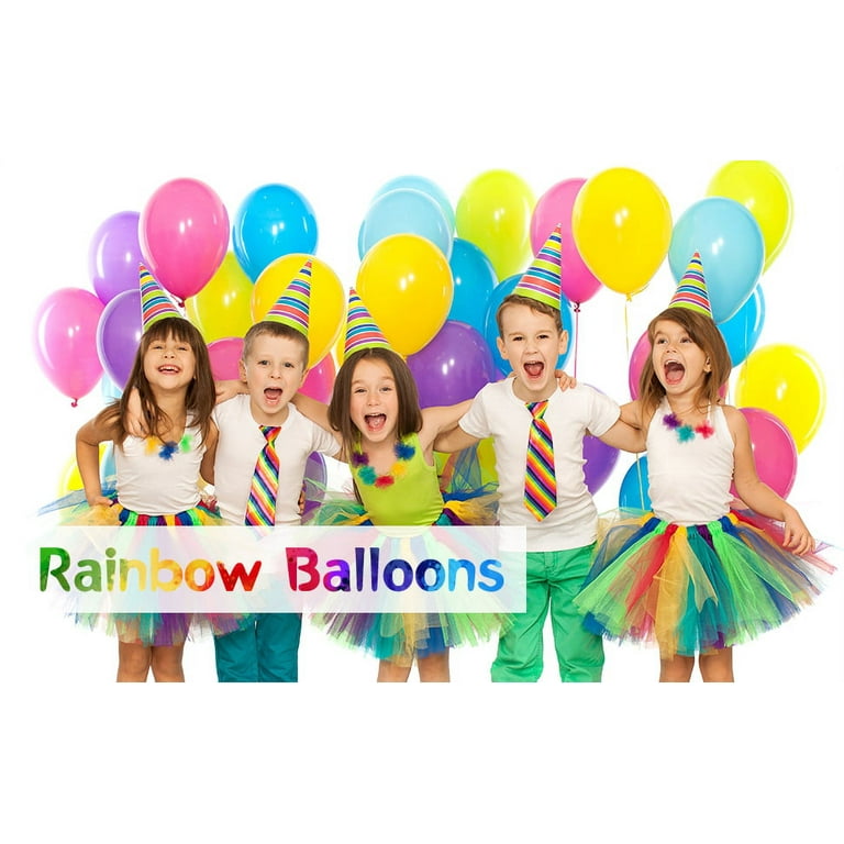 This rainbow children's birthday party was a swirl of bright colors,  from t…