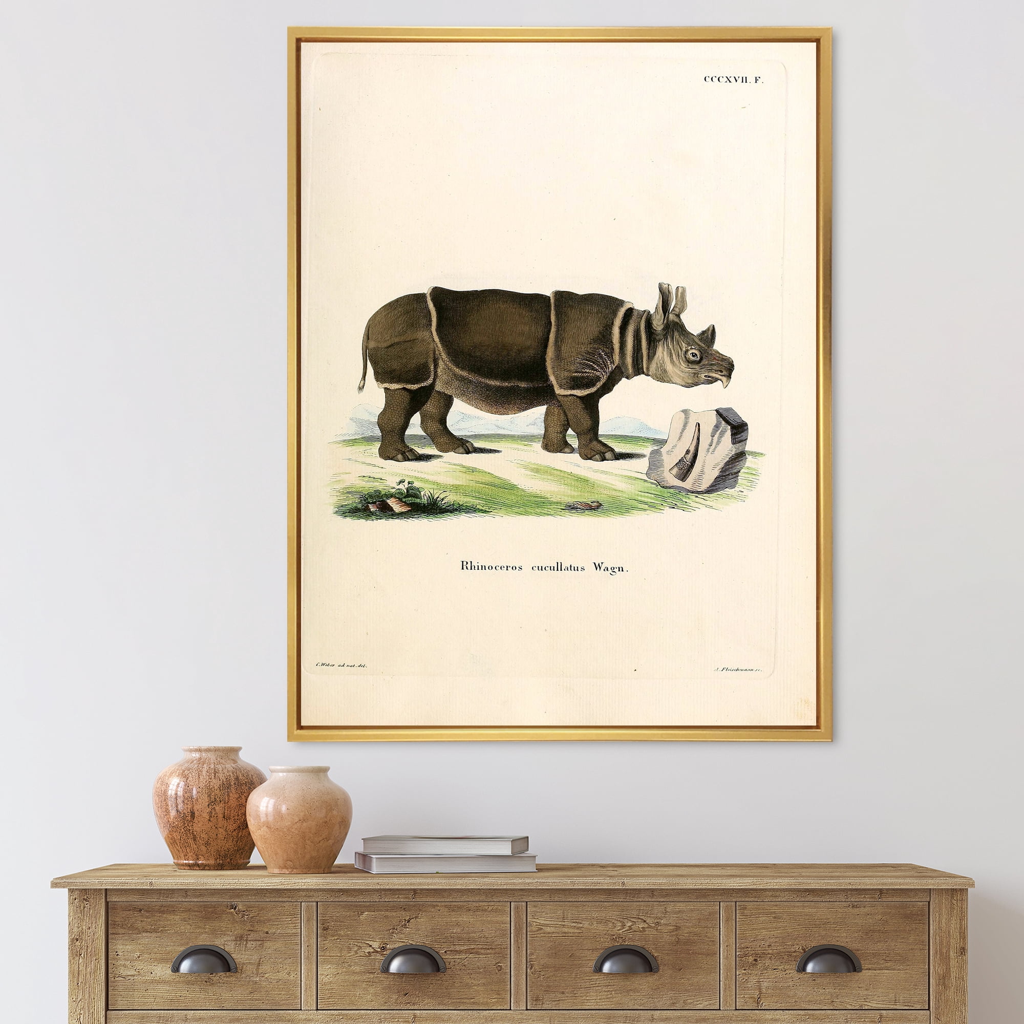 Ancient Rhinoceros 12 in x 20 in Framed Painting Canvas Art Print, by Designart