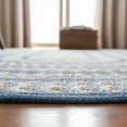 thumbnail image 4 of SAFAVIEH Braided Tanisha Bordered Reversible Area Rug, Ivory/Blue, 3' x 5' Oval, 4 of 10