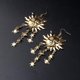 thumbnail image 2 of Pendientes colgantes de cristal Yashi con diseño de estrella de sol y borlas bohemias dorados, 2 of 4