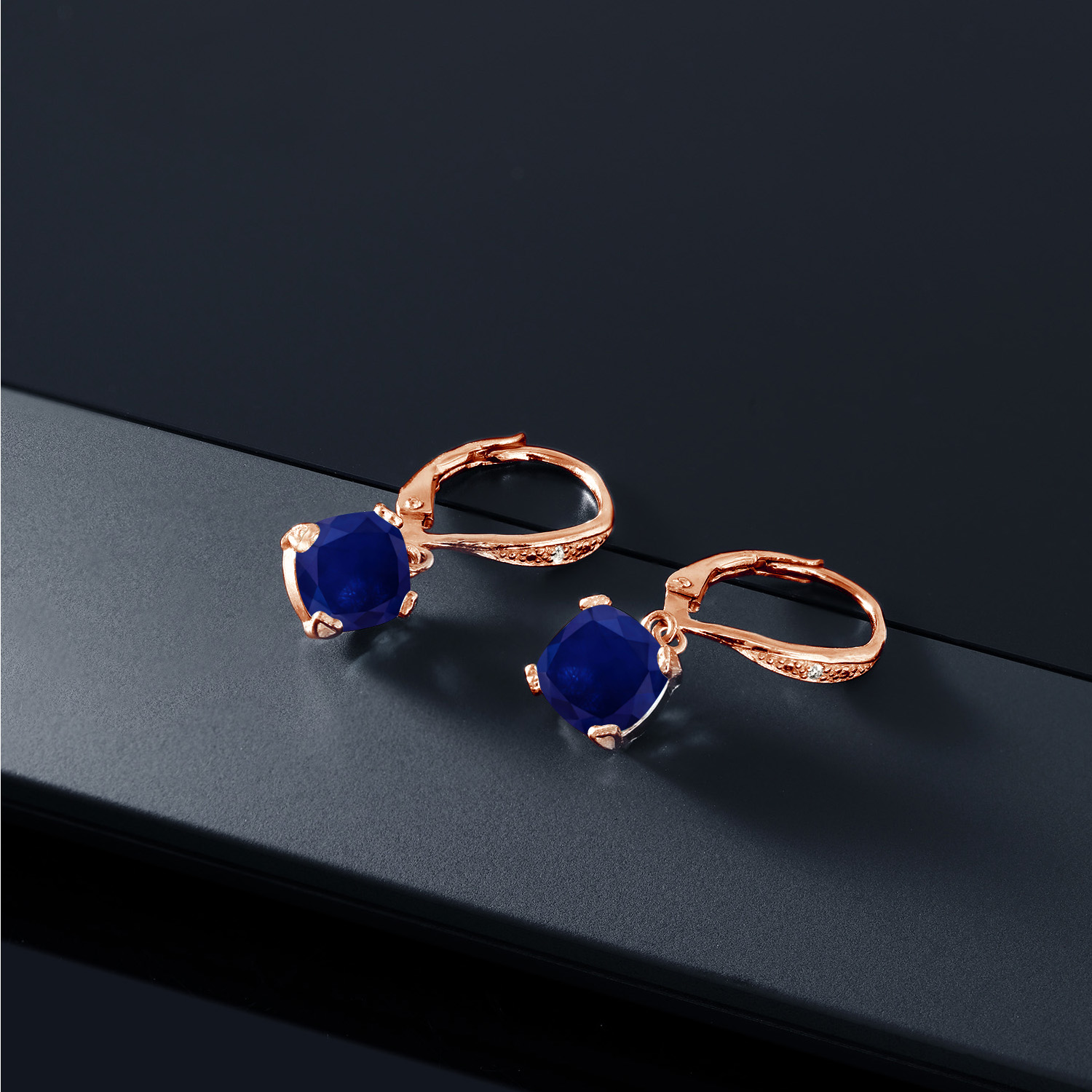 Gem Stone King 18K Rose Gold Plated Silver Blue Sapphire and White Diamond Earrings for Women (4.01 Cttw, Gemstone September Birthstone, Cushion 7MM)