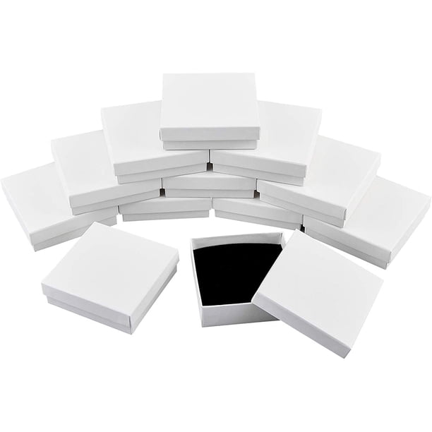 Caja de joyería cuadrada de cartón blanco leche (12 unidades) para colgantes, collares y pulseras. Incluye relleno de esponja.