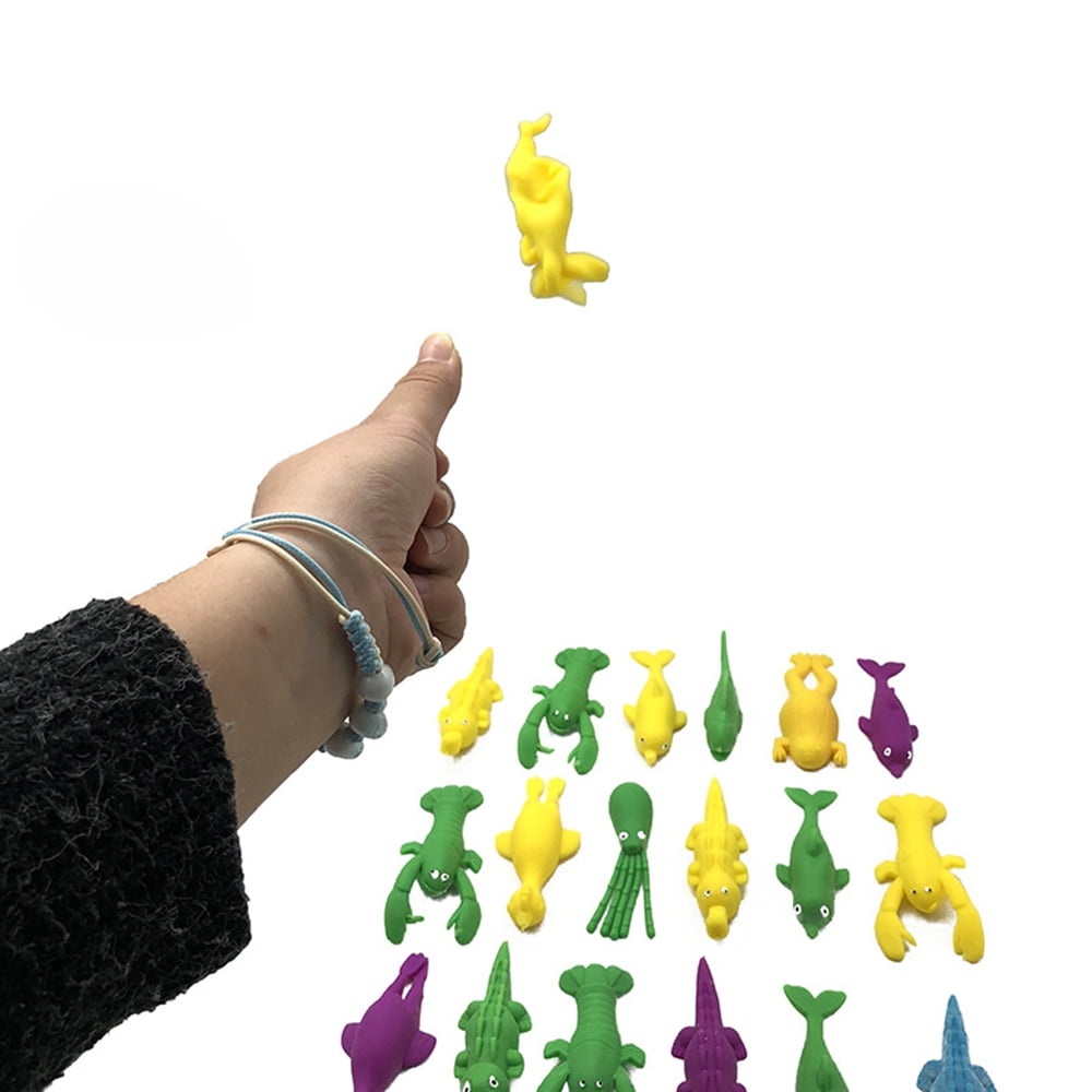 SeekFunning 10 Pcs Slingshot Dinosaur Finger Toys Catapult Toys as Fun as Slingshot  Chicken Cute Shapes More Colors Great for Flying Games 