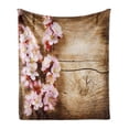 thumbnail image 1 of Floral Soft Flannel Fleece Throw Blanket, Spring Blossom Orchard Featured Plant on Wooden Board Background Image, Cozy Plush for Indoor and Outdoor Use, 70" x 90", Sand Brown Pale Pink, by Ambesonne, 1 of 6