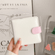 thumbnail image 2 of Álbum de fotos de 3 pulgadas con cuatro cuadrículas y hojas sueltas con hebilla magnética de PU en combinación de colores rosa y blanco para guardar tarjetas pequeñas, 2 of 5
