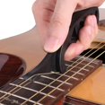 thumbnail image 4 of 1 extractor de cuerdas de guitarra para asegurar instantáneamente cuerdas nuevas con la herramienta de extractor de cuerdas de guitarra., 4 of 5