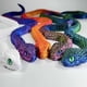 thumbnail image 2 of Juguete impreso en 3D con forma de serpiente articulada, junta flexible, de resina, 60 cm, 2 of 7