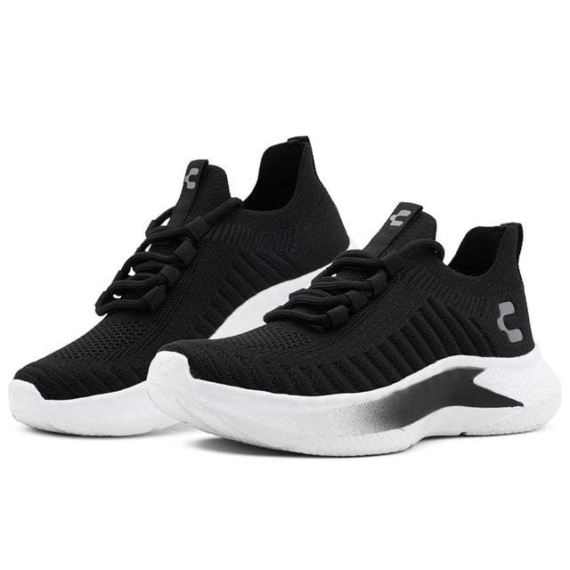 tenis running charly para caballero textil negro memory foam negro 28.5 Tenis deportivos slip-on en textil negro con silueta tipo calcetín, cordones elásticos integrados, logo lateral gris y entresuela blanca con degradado negro; plantilla memory foam, vista 3/4 sobre fondo blanco. Adecuados también para uso casual y caminatas cortas.