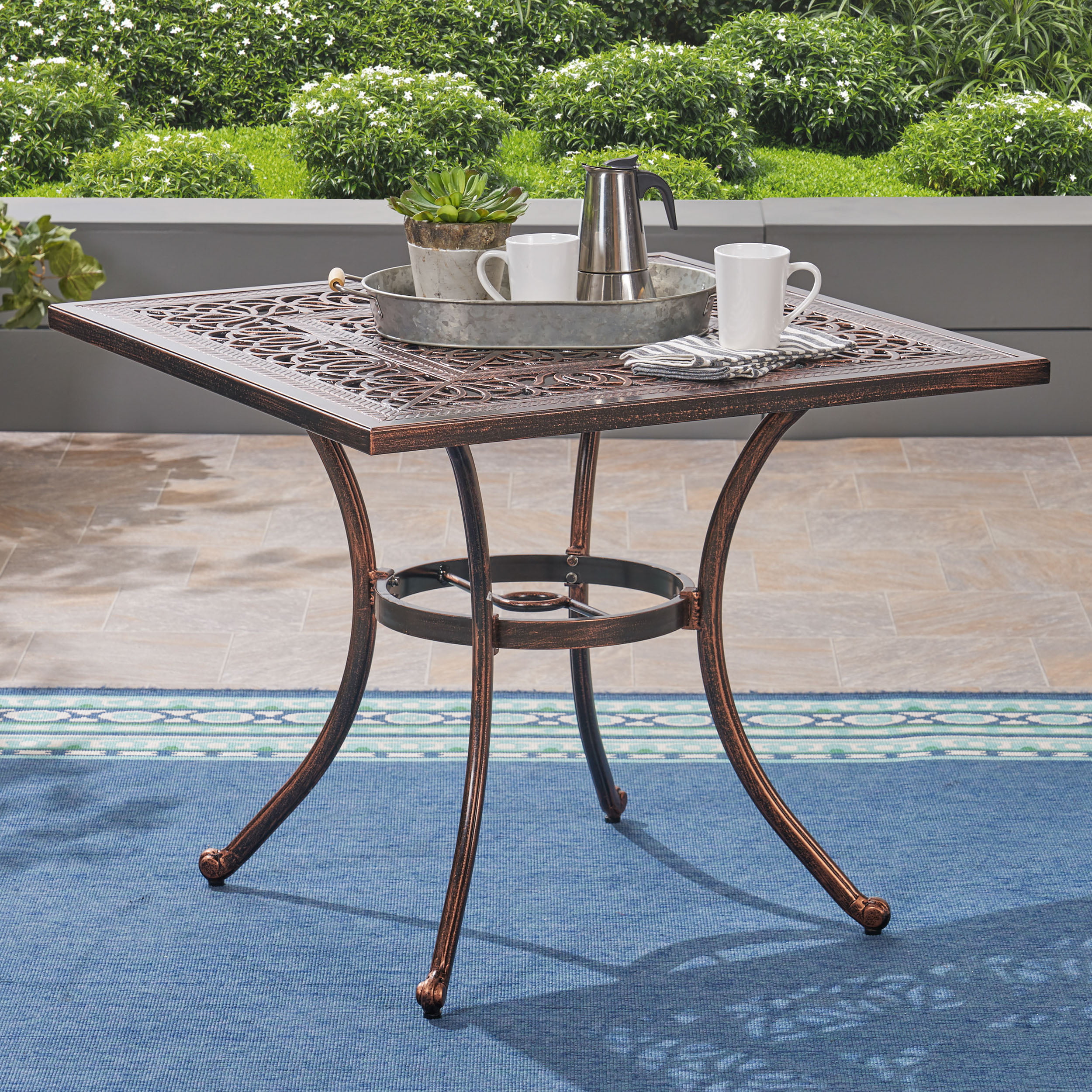 clayton outdoor square cast aluminum dining table, shiny copper