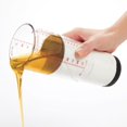 thumbnail image 4 of Vaso medidor OXO Good Grips, 500 ml, ajustable, transparente y negro, 4 of 9