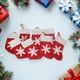 thumbnail image 3 of 24 mini calcetines navideños con forma de copo de nieve, ideales para decorar dulces y aperitivos. Perfectos para fiestas., 3 of 8
