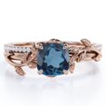 thumbnail image 1 of Wreath Leaf 0.65 TCW Cushion Cut London Blue Topaz and Moissanite Pave Accented Bridal Ring Set in 18K Rose Gold Plating over Silver, 1 of 4
