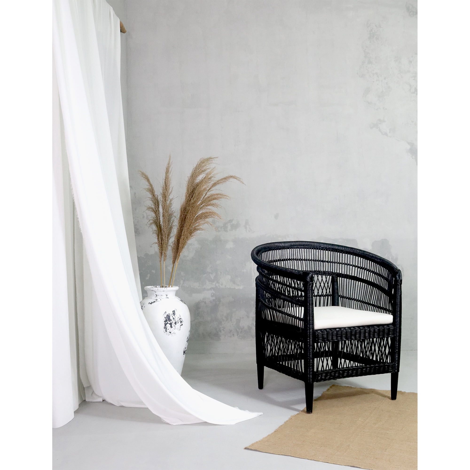 Symka Curved Back Black Woven Rattan Armchair with Padded Seat