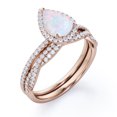thumbnail image 4 of JeenMata Halo Pave Design - 1.5 Carat Pear Cut Rainbow Opal and Moissanite - Infinity Twisted Shank Wedding Ring Set - 18K Rose Gold Plating over Silver, 4 of 7