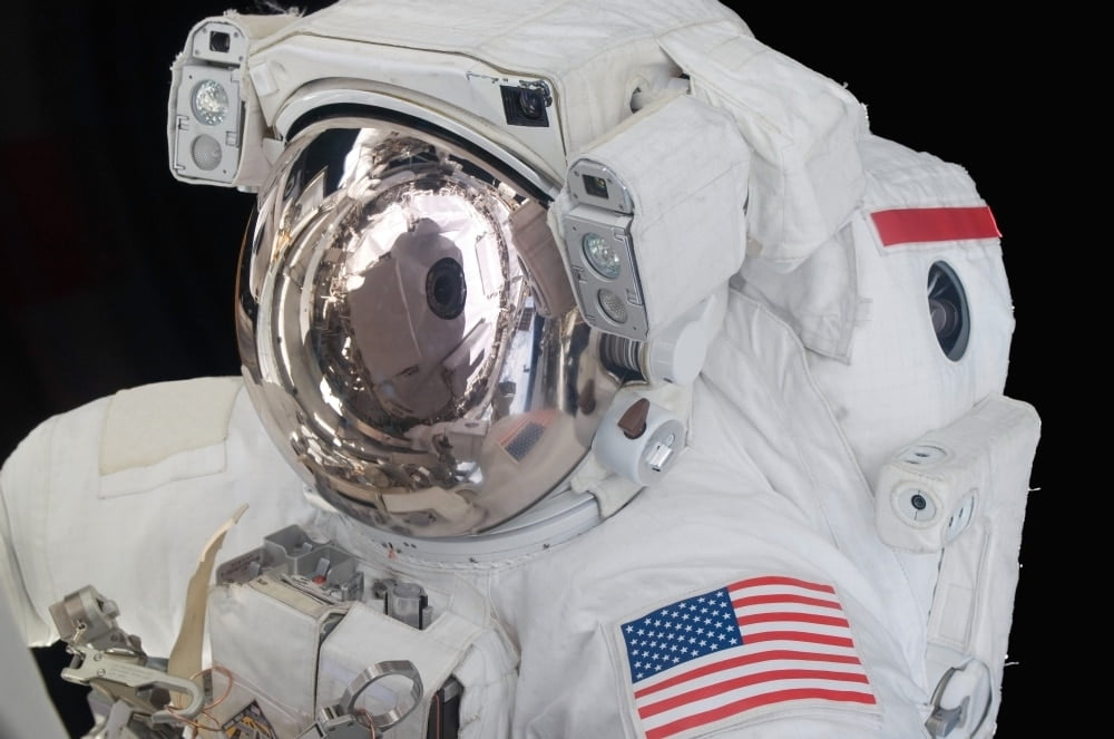 Astronaut's helmet visor during a spacewalk Poster Print
