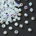 thumbnail image 3 of Preciosaeg Beads Czech Bicone(451 69 302 Rondelle) 01000 200 White Opal AB 4mm Hole: 0.8mm, 3 of 5