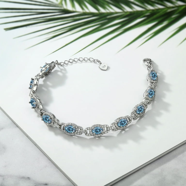 Gem Stone King Sterling Silver Swiss Blue Topaz Tennis Bracelet - 4.20 Ct Oval 6x4mm, 7 Inch With Extender