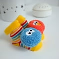 thumbnail image 3 of Kids Preferred Sesame Street Elmo and Cookie Monster Foot Rattle Set, 3 of 6