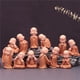 thumbnail image 3 of Lindas estatuas de monje pequeño, figuritas de Buda religioso, artesanías de resina, miniaturas de escritorio, adornos, accesorios, decoración del hogar, decoración del coche, 3 of 4