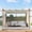 Brown Frame & Beige Canopy & White Side Mesh Screen, variant on WildBreak 10 x 13 feet Outdoor Pergola, with Canopy and Side Mesh Screen, Beige & White
