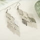 thumbnail image 1 of Pendientes de hojas de moda de color, pequeños pendientes de nueve piezas, pendientes de piezas de computadora europeas y americanas, accesorios de cobre, joyería, 1 of 6