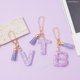 thumbnail image 5 of Llavero con letras de la A a la Z con forma de corazón morado, colgante para billetera de mujer, 26 iniciales, alfabeto, mariposa, borla, accesorio para llavero, 5 of 6