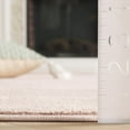 thumbnail image 4 of SAFAVIEH Revive Hyram Solid Polyester Area Rug, Pink, 9' x 12', 4 of 7