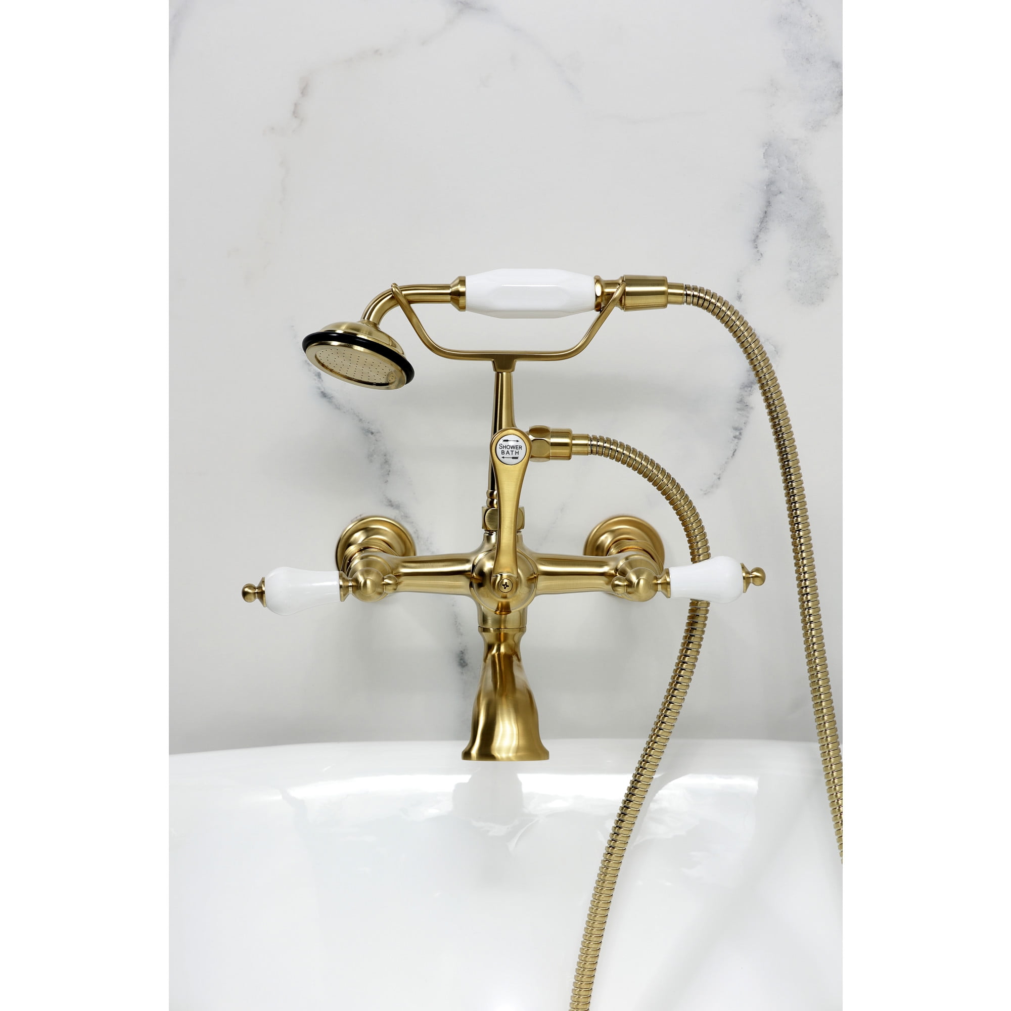 Kingston Brass CC543T7 Vintage 7-Inch Wall Mount Tub Faucet with Hand Shower, Brushed Brass