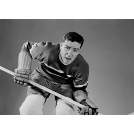 Mid adult ice hockey player Canvas Art - (18 x 24)