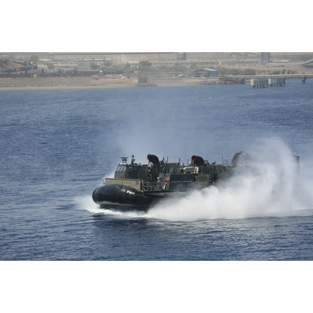 Aqaba Jordan June 22 2013 - A landing craft air cushion from Assault Craft Unit 4 approaches the amphibious assault ship USS Kearsarge Poster