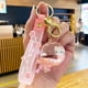 thumbnail image 3 of Llavero personalizado personalizado de Hello Kitty, botella de leche acrílica, líquido que fluye, llavero de arena movediza, colgante de líquido móvil, 3 of 4
