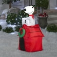 thumbnail image 2 of 42" Airblown® Inflatable Peanuts® Christmas Snoopy Flying Ace on Doghouse Outdoor Yard Decoration, 2 of 4