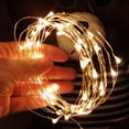 thumbnail image 4 of Lampara Luces de cadena solares Lámpara de 2 modos de alambre de cobre resistente al agua (blanco cálido 100LED) Likrtyny Lámpara, 4 of 9