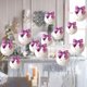 thumbnail image 4 of Adornos navideños de bolas moradas con copos de nieve - Paquete de 12 unidades de 6 cm con ganchos para árbol, ventana y decoración festiva, 4 of 6