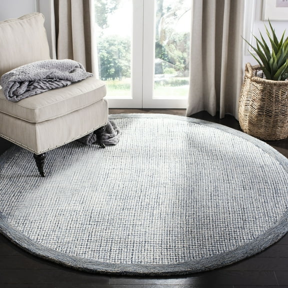 SAFAVIEH Abstract Clive Bordered Wool Area Rug, Navy/Ivory, 4' x 4' Round