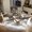 Clear with Bronze, variant on POVISON 51"Modern Round Glossy White Dining Table for 4, Sintered Stone Tabletop with Bronze X Carbon Steel Base