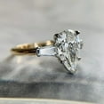 thumbnail image 2 of SOLITAIRE JEWELS 2.9ct Pear Cut Three Stone Side Tapered Baguette Moissanite Engagement Ring 10K Two Tone Gold, 2 of 4