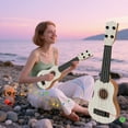 thumbnail image 5 of LanSuare Simulation Ukulele Guitar Toy, Classical Guitar Musical Toy, 4 Strings Guitar Ukulele Educational Learning Toy for Preschoolers, 5 of 6