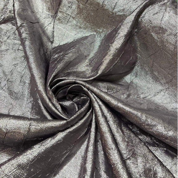 Poly viscose matalic Crushed taffeta 45” wide. Beautiful black silver matalic fabric. Best used for apparel  home decor. Sold by the yard.