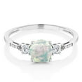 thumbnail image 2 of Gem Stone King 10K White Gold White Simulated Opal Created Sapphire and Diamond Accent 3-Stone Engagement Ring for Women (0.45 Cttw, Round Cabochon 6MM, Gemstone October Birthstone), 2 of 5