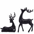 thumbnail image 1 of AQITTI Decoraciones navideñas de reno Adornos de ciervo 2 piezas Estatuas de ciervo de resina sentadas y de pie Figuras de reno navideñas de estilo moderno negro Adorno de escritorio para sala de, 1 of 7