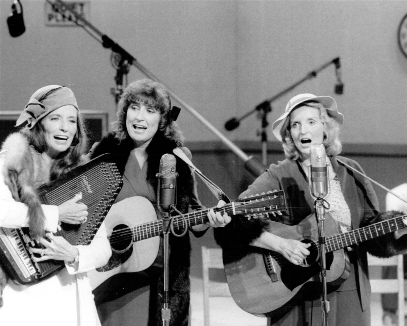 June Carter plays autoharp with sisters Anita & Helen playing guitars