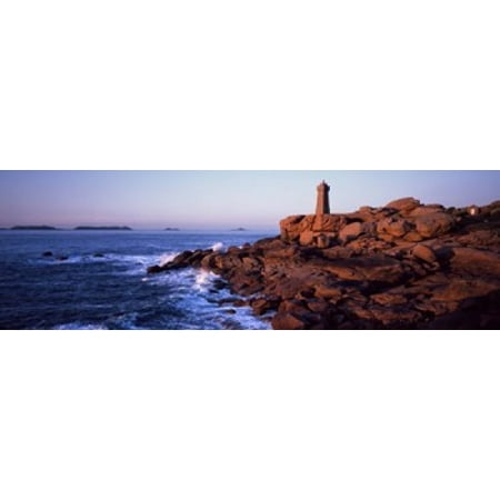 Lighthouse on the coast Ploumanach Lighthouse Cote De Granit Rose Cotes-DArmor Brittany France Canvas Art - Panoramic Images (18 x