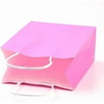 thumbnail image 4 of 12 bolsas de papel kraft de color rosa intenso, lisas, rectangulares, con asas de cordel de papel. Medidas: 15 x 11 x 6 cm., 4 of 4