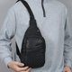 thumbnail image 4 of Bolso bandolera impermeable para hombre, multiusos, para deportes al aire libre, mochila ligera de viaje con puerto para auriculares, ideal para ir al trabajo o hacer senderismo., 4 of 6